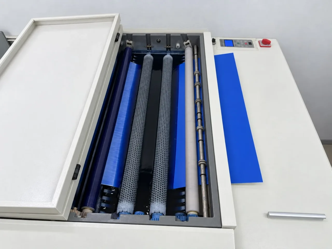 Each plate is processed and cleaned before it goes to press
